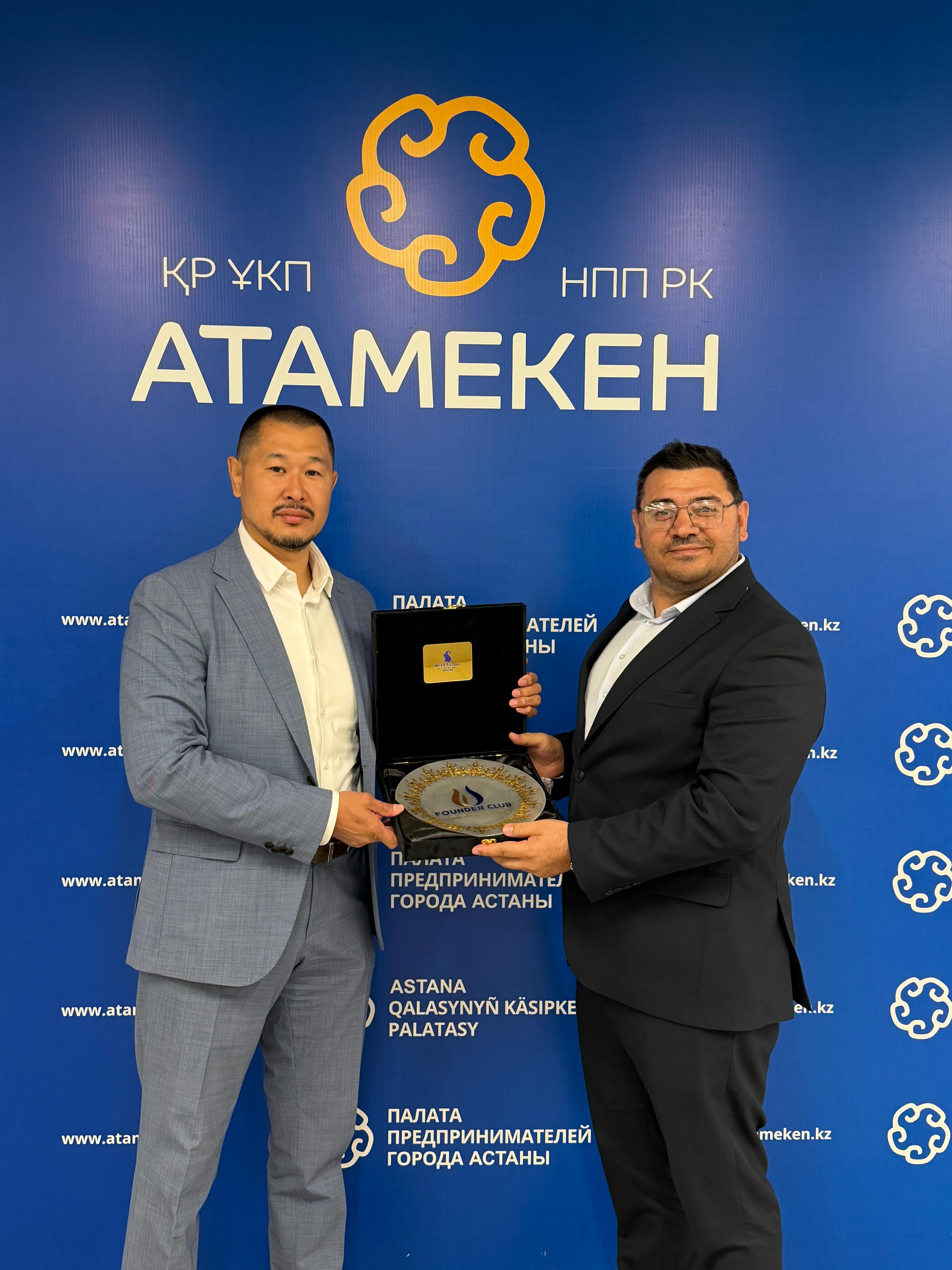 Gift presentation at the ATAMEKEN National Chamber of Entrepreneurs